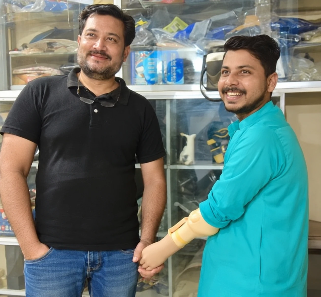 Sunil with his companion after receiving a prosthetic arm in 2023.