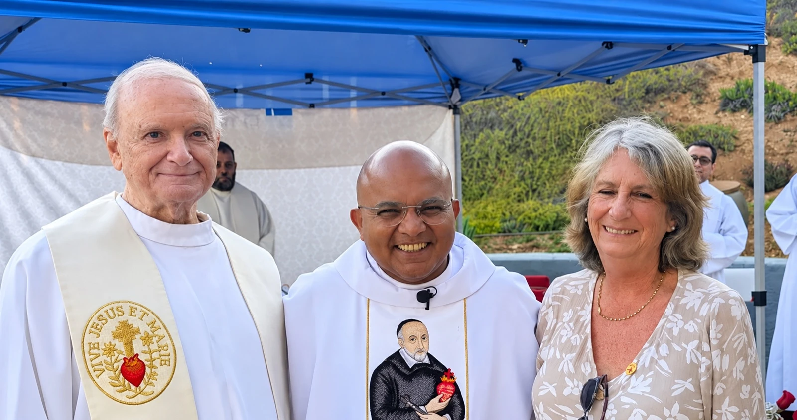 Eudist leaders gathered at an outdoor mission celebration.